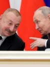 Азербайжандын жана Орусиянын президенттери Илхам Алиев менен Владимир Путин. Архив