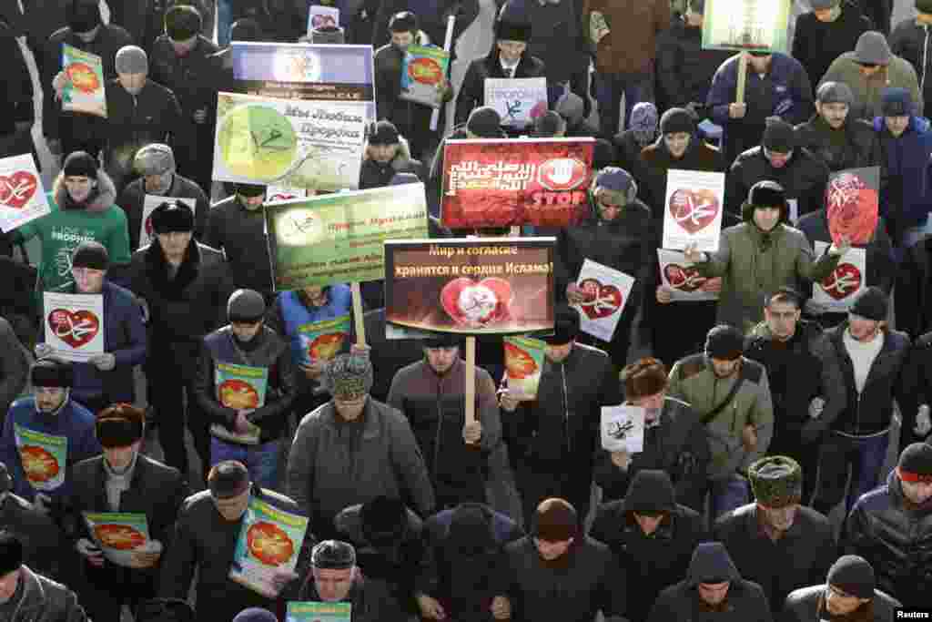 Grozny&#39;s Russian Orthodox Bishop also addressed the rally, condemning the cartoons. Russia has banned its media from reproducing the Charlie Hebdo cartoons.