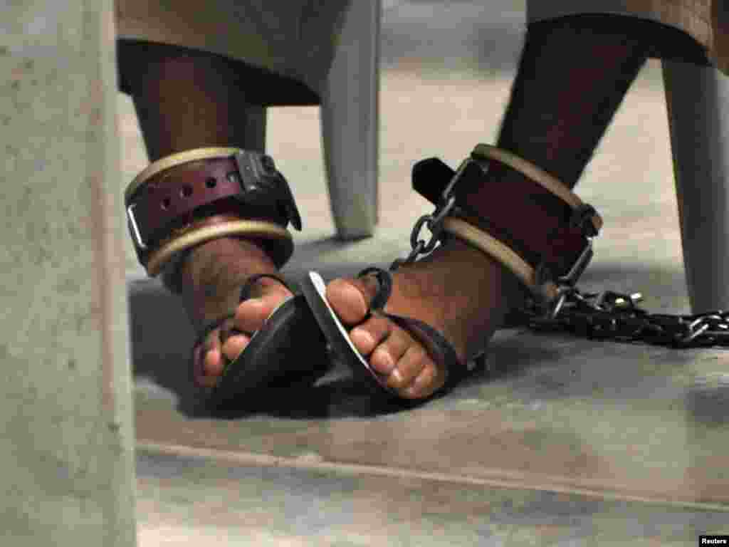 A detainee's feet are shackled to the floor as he attends a "Life Skills" class inside the high-security Camp 6 at Guantanamo Bay.